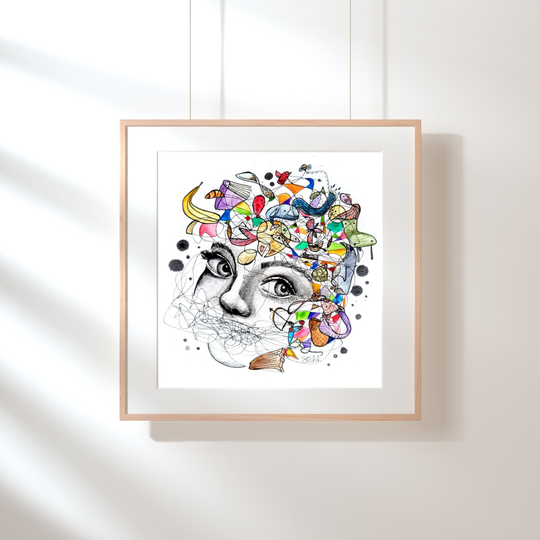A framed art print featuring a vibrant, abstract design with a central face surrounded by colorful elements, displayed on a wall.